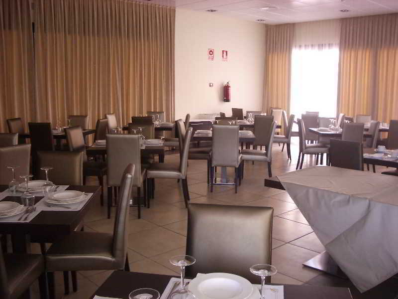 فندق Alcala Plaza الكالا ذي إِناريس المطعم الصورة